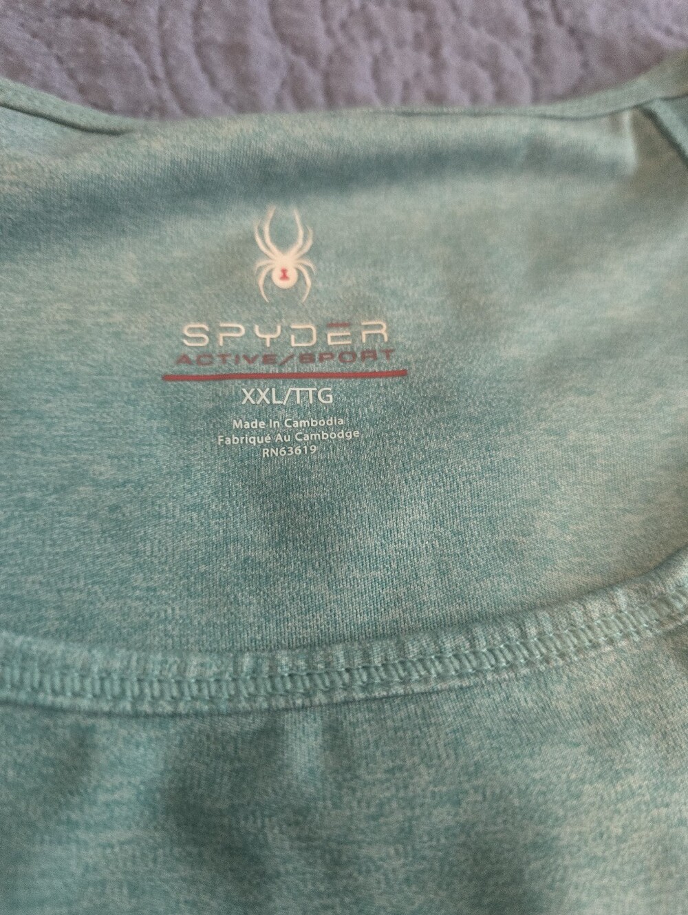 Spyder teal athletic tank top features breathable mesh panels on the shoulders. - Picture 5 of 5